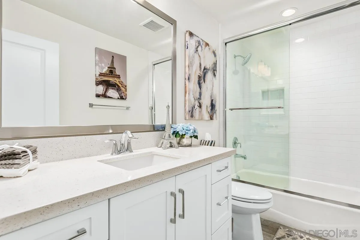 347 Oak Avenue Carlsbad, CA 92008 - Photo 26 of 34 a bathroom with a sink a toilet and shower