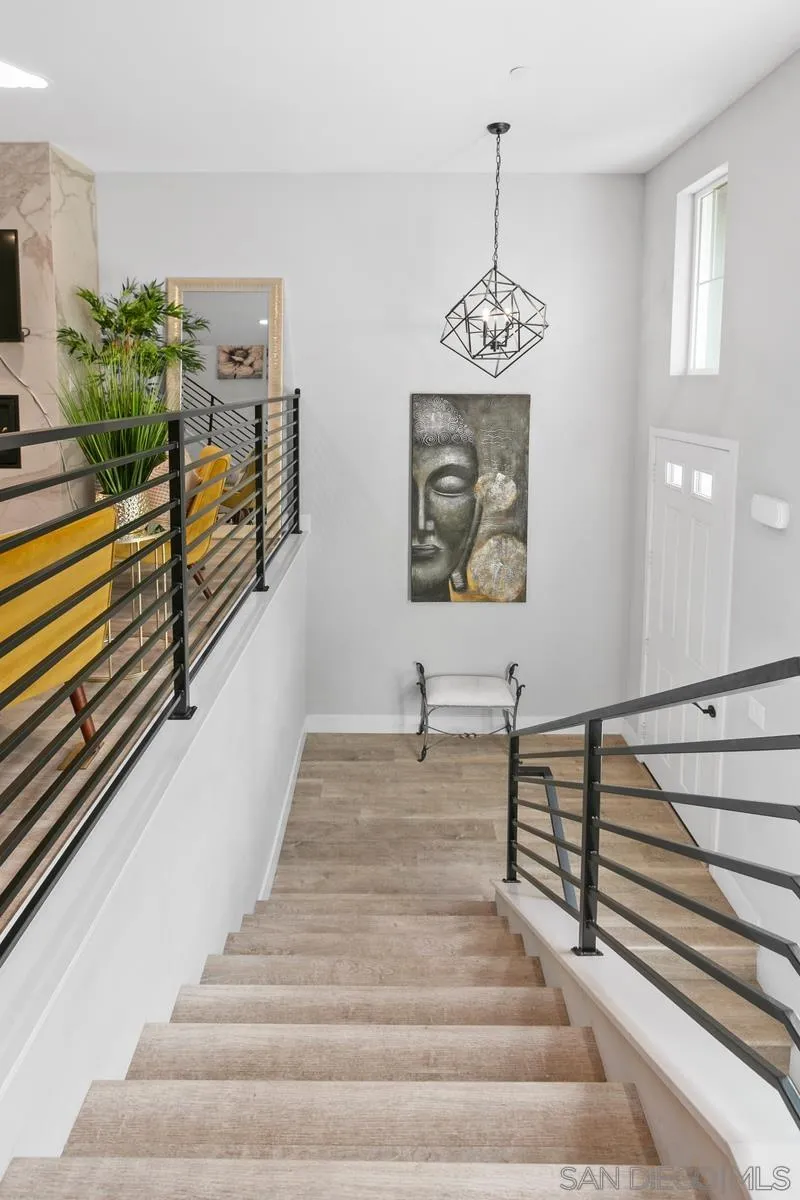 347 Oak Avenue Carlsbad, CA 92008 - Photo 31 of 34 a view of entryway and hall with wooden floor