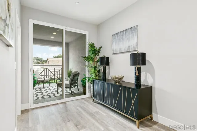 a view of entryway with wooden floor