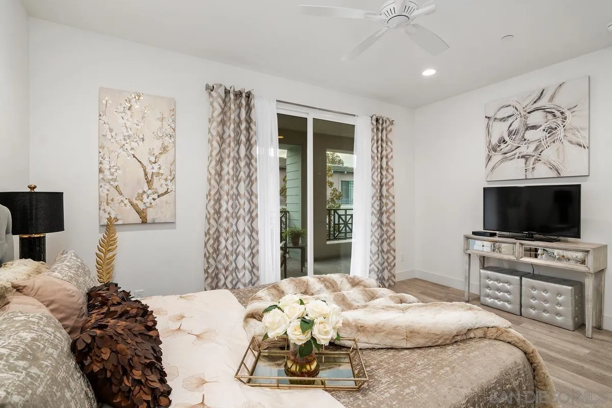347 Oak Avenue Carlsbad, CA 92008 - Photo 9 of 34 a bedroom with a bed and a flat screen tv