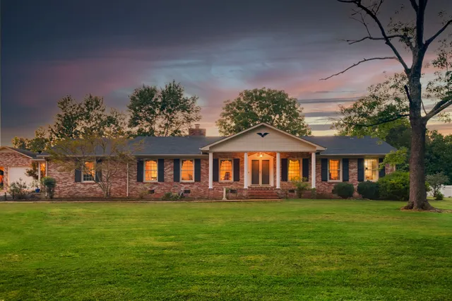 a view of a house with a swimming pool