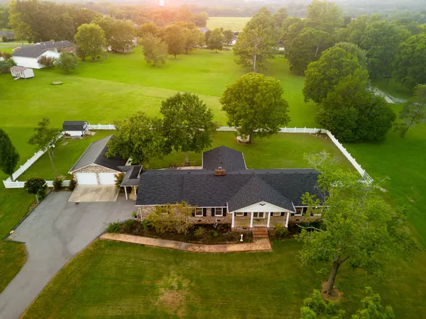 a view of a house with a swimming pool