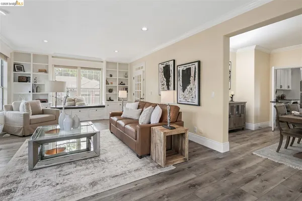 a living room with furniture and a table