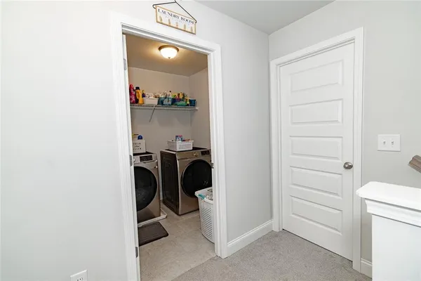 a utility room with a washer and dryer