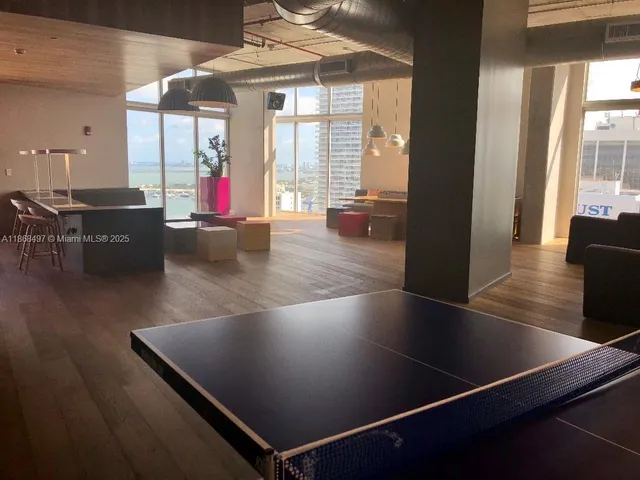 an outdoor space with lounge chair