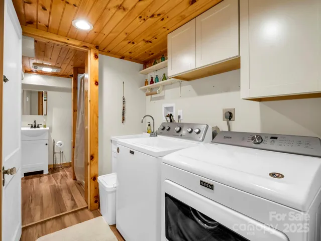 a utility room with dryer and washer