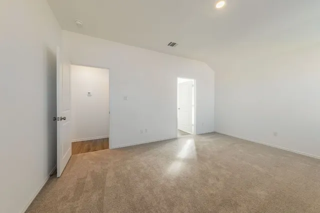 a bathroom with a shower sink vanity granite and mirror