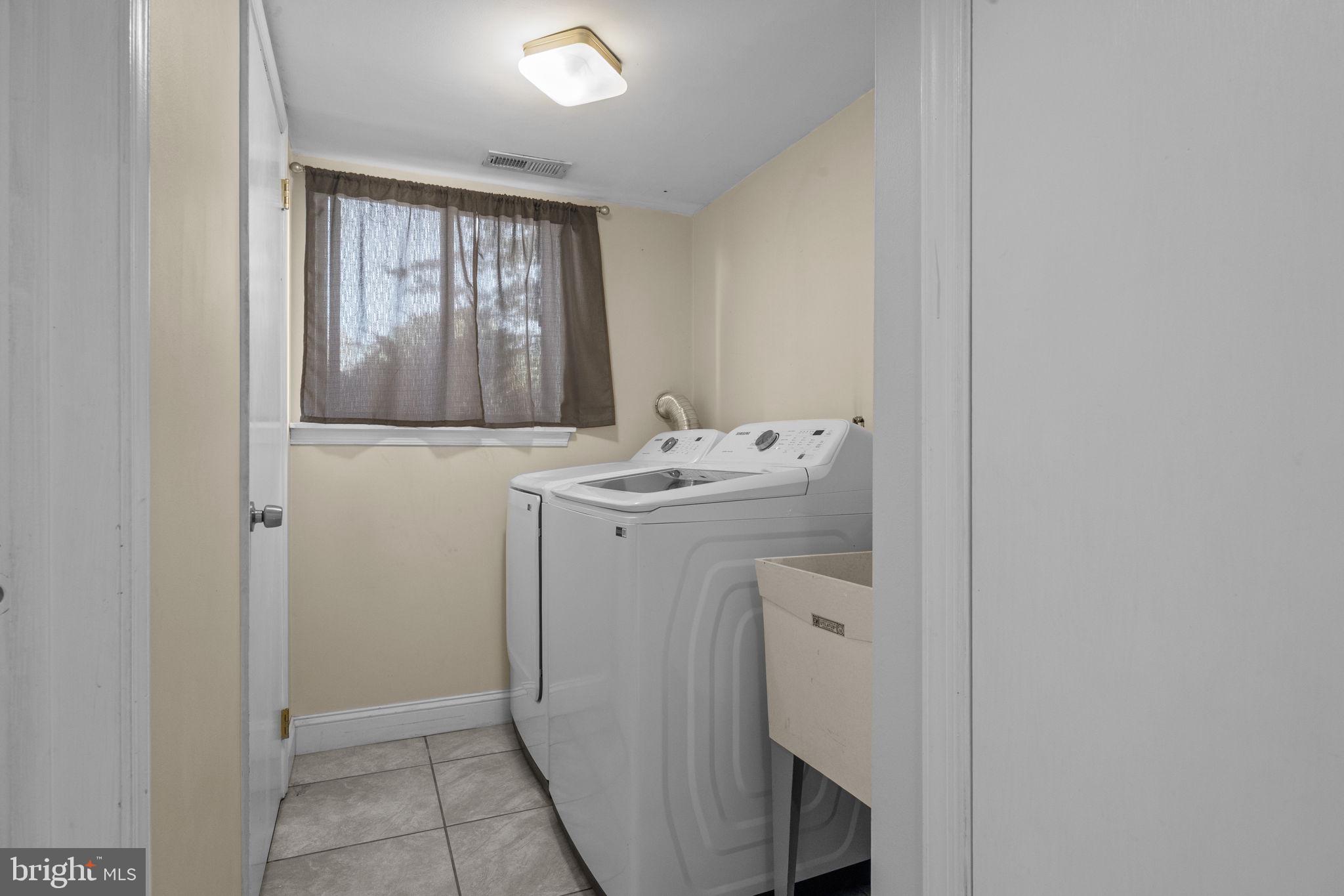 1006 North York Road, Unit 1 Willow Grove, PA 19090 - Photo 11 of 26 a utility room with dryer and washer