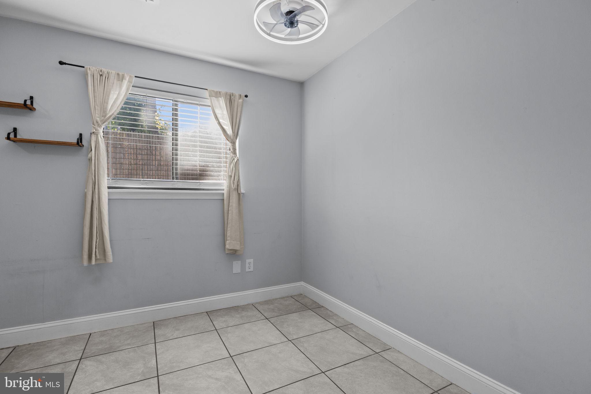 1006 North York Road, Unit 1 Willow Grove, PA 19090 - Photo 15 of 26 a view of empty room with window