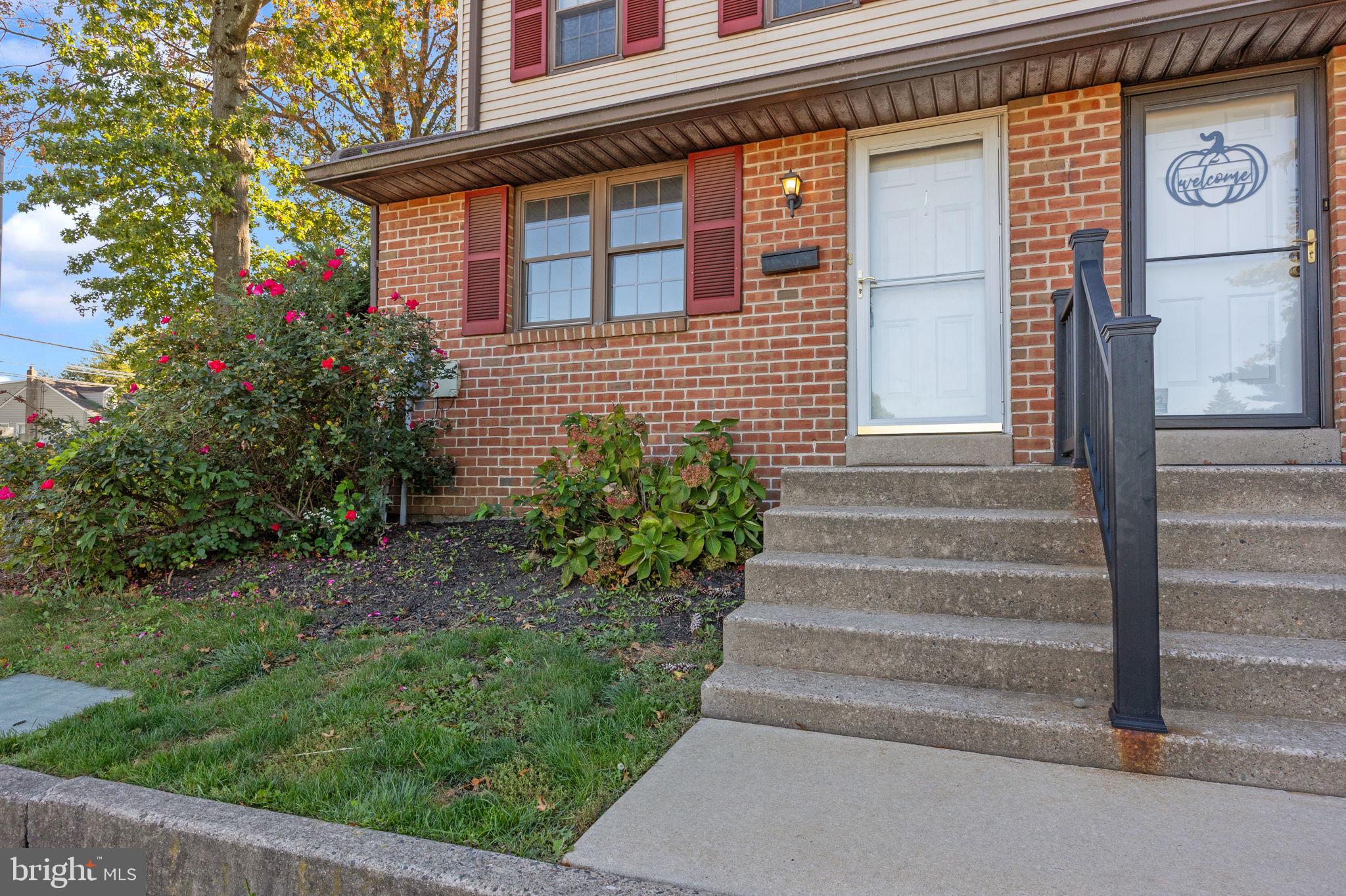 1006 North York Road, Unit 1 Willow Grove, PA 19090 - Photo 3 of 26 a view of a house with potted plants
