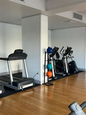 a view of a room with gym equipment