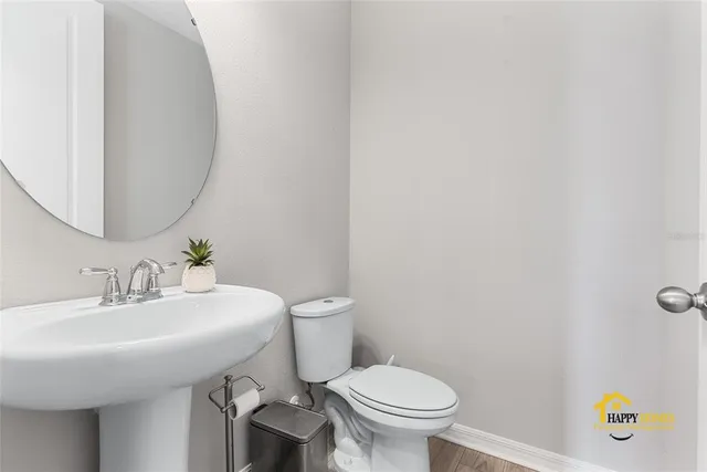 a bathroom with a sink and a toilet