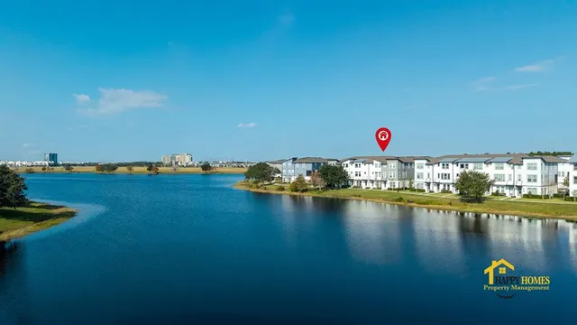 a view of a lake with houses