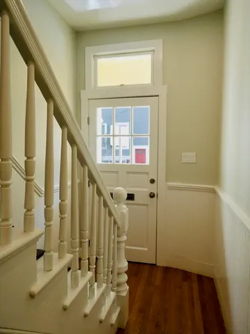 a view of front door with stairs