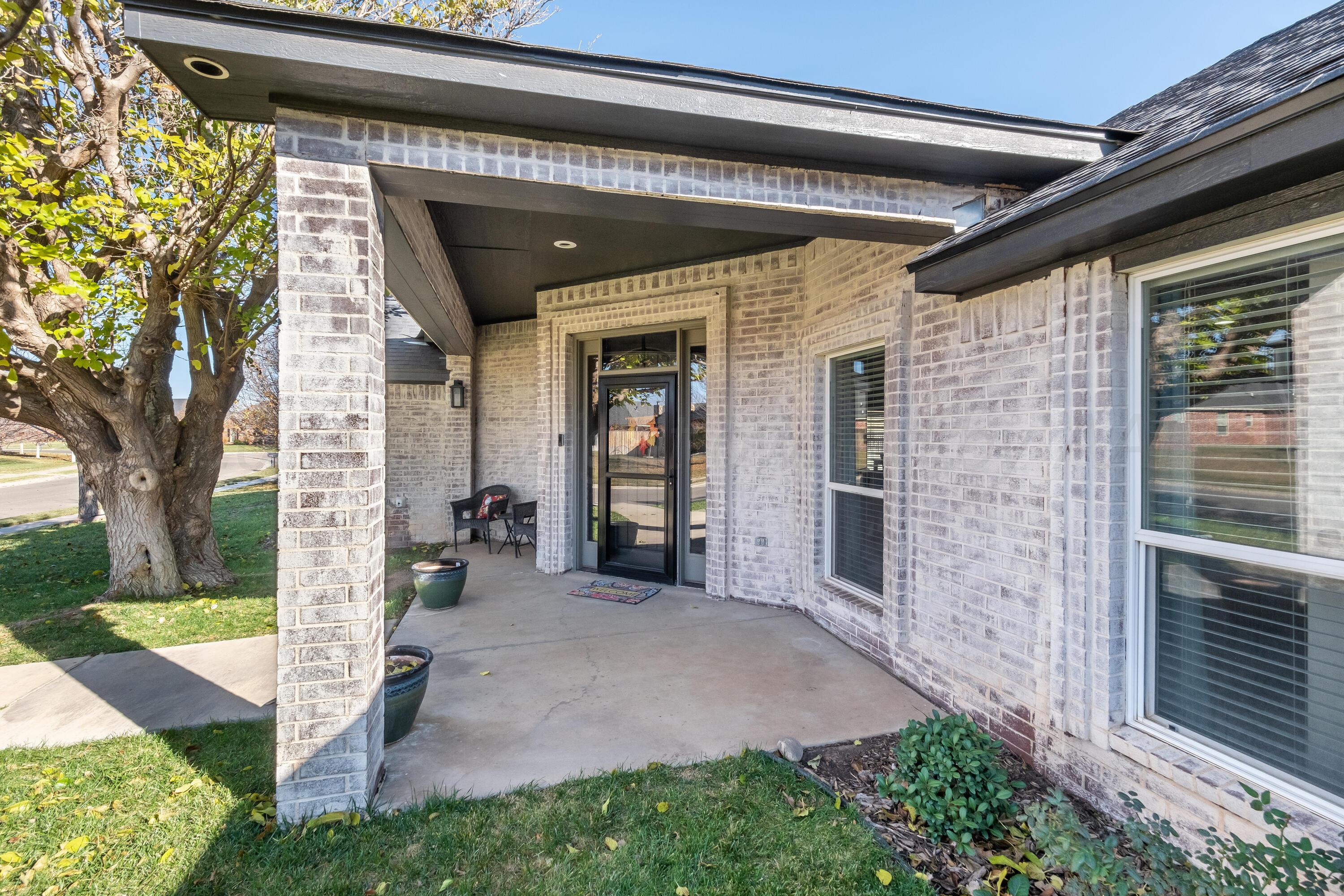 8413 Hamilton Drive Amarillo, TX 79119 - Photo 4 of 54 a view of a porch of the house