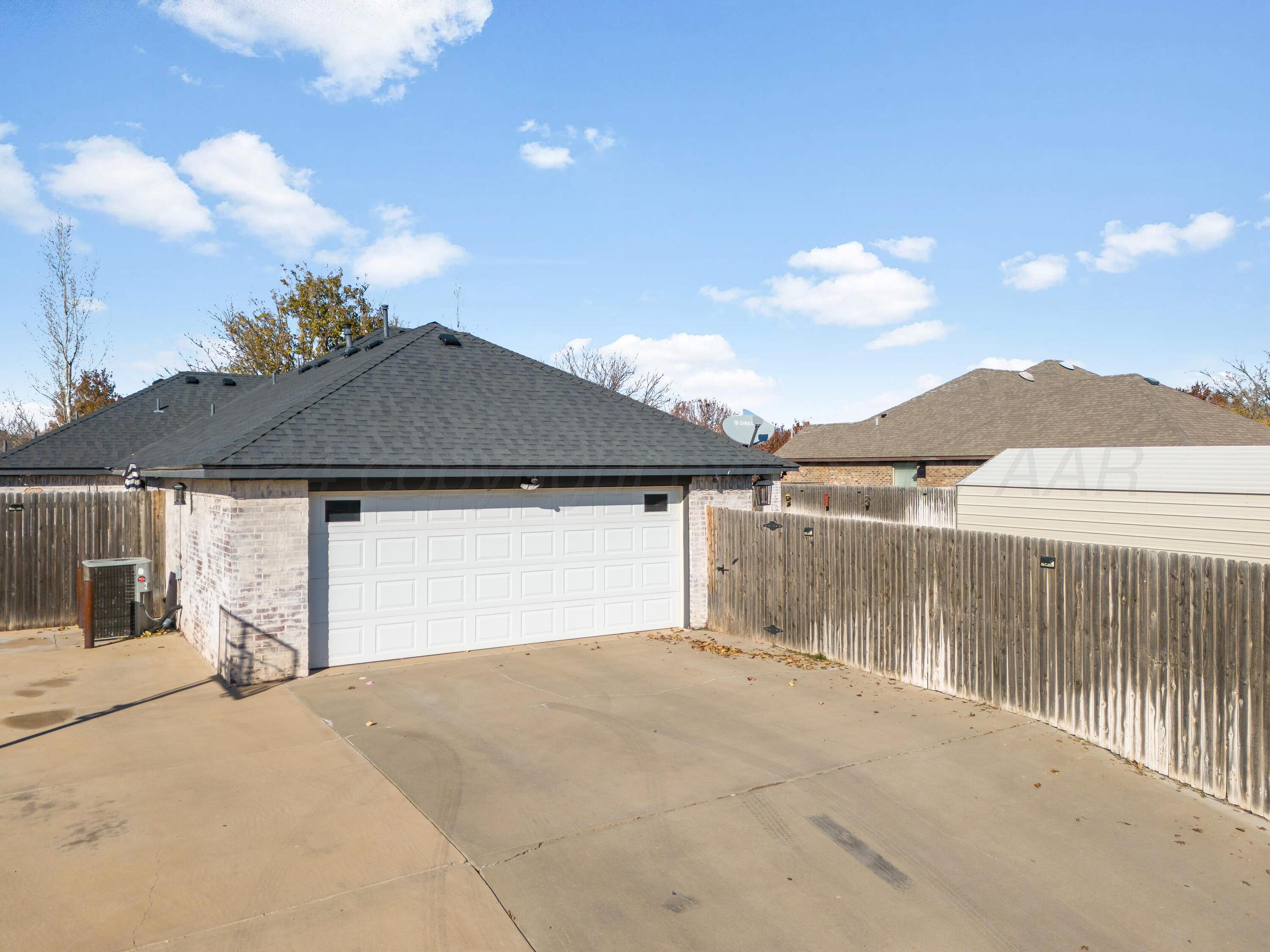8413 Hamilton Drive Amarillo, TX 79119 - Photo 46 of 54 a front view of a house with a yard and mountain view