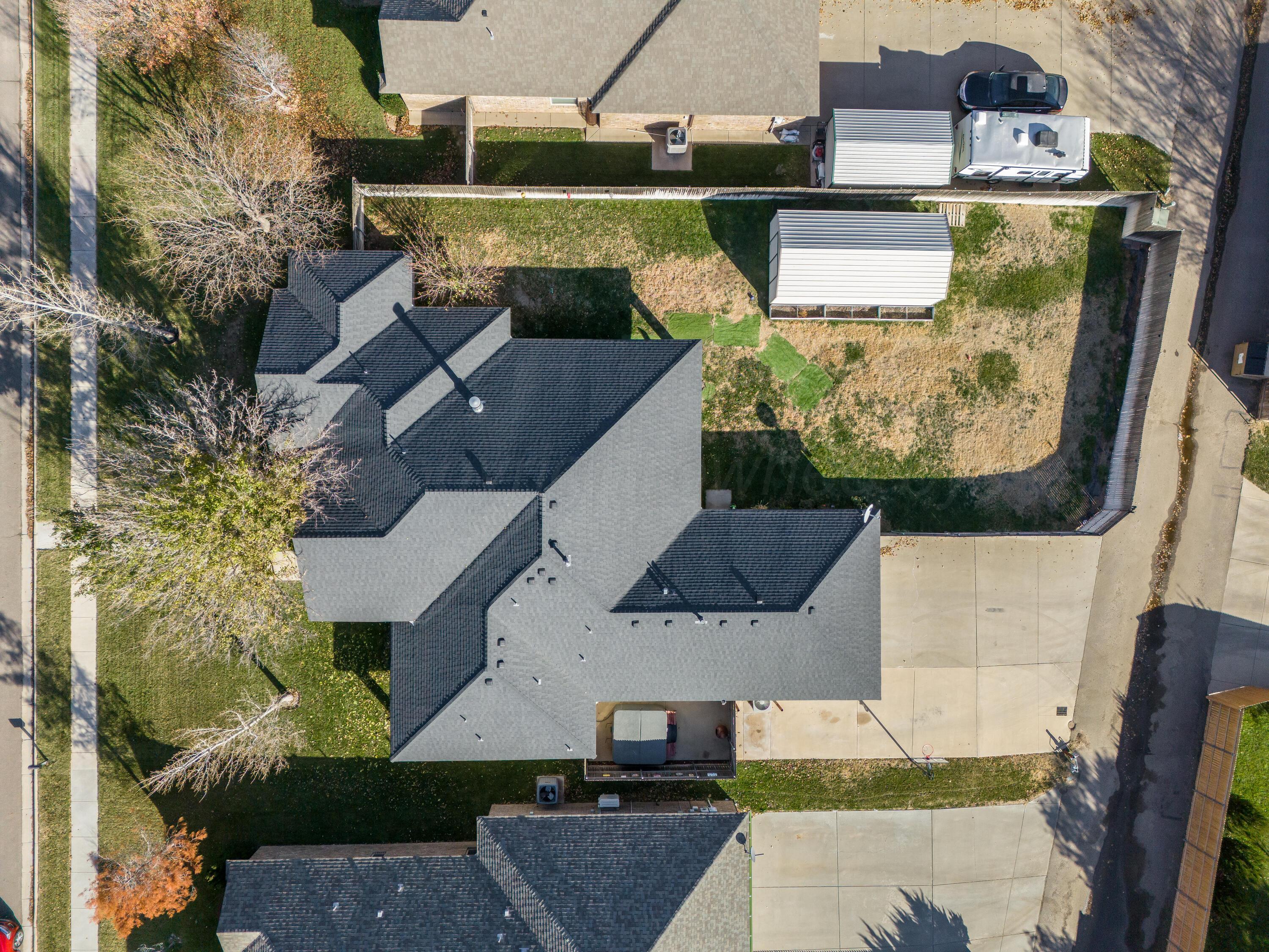 8413 Hamilton Drive Amarillo, TX 79119 - Photo 54 of 54 an aerial view of a house with a yard
