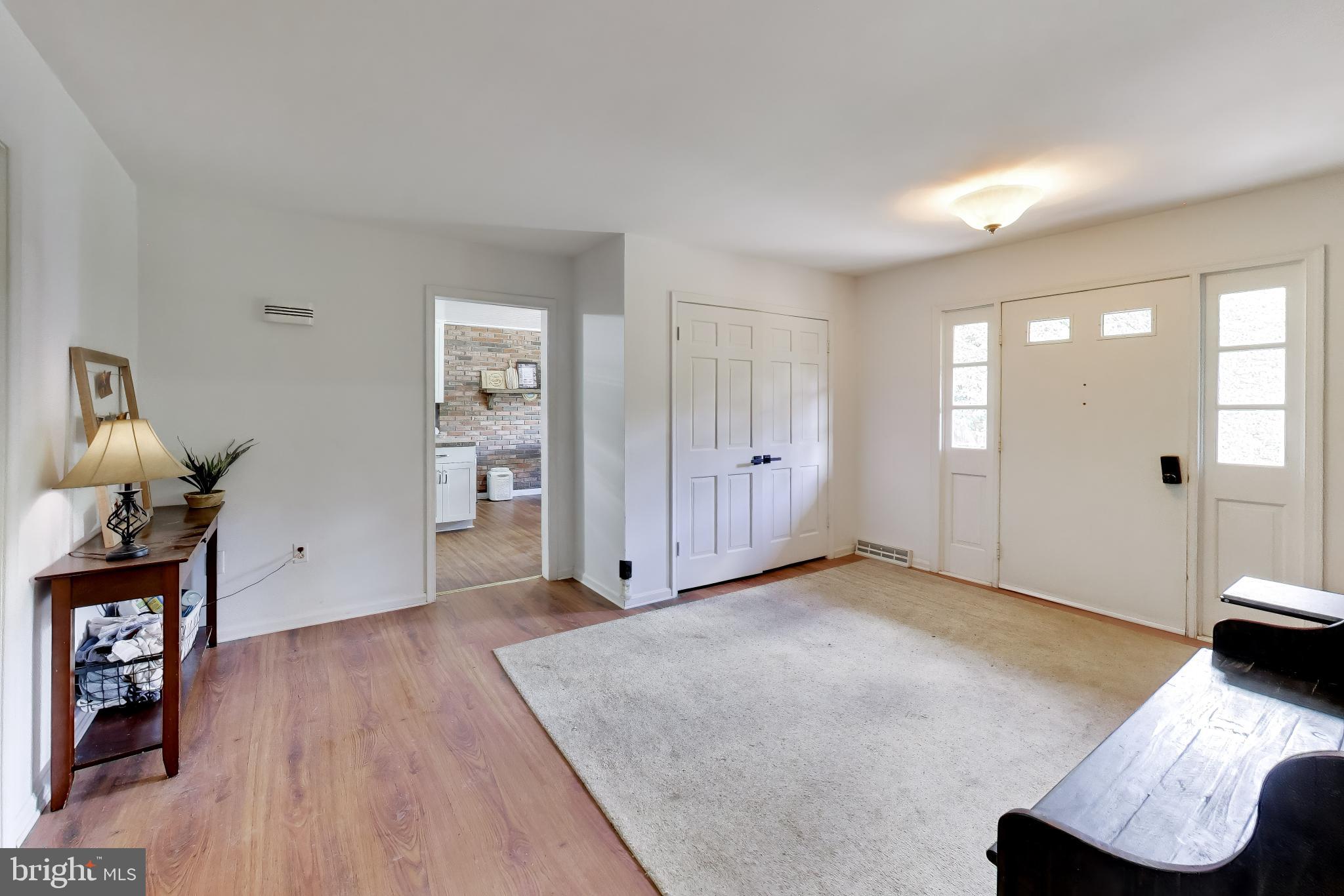 3240 Juniper Lane Huntingtown, MD 20639 - Photo 36 of 48 a view of an empty room and wooden floor