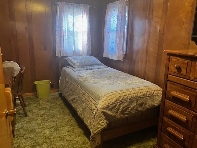 425 East Dakota Street Spring Valley, IL 61362 - Photo 9 of 20 a bedroom with a bed and a chandelier