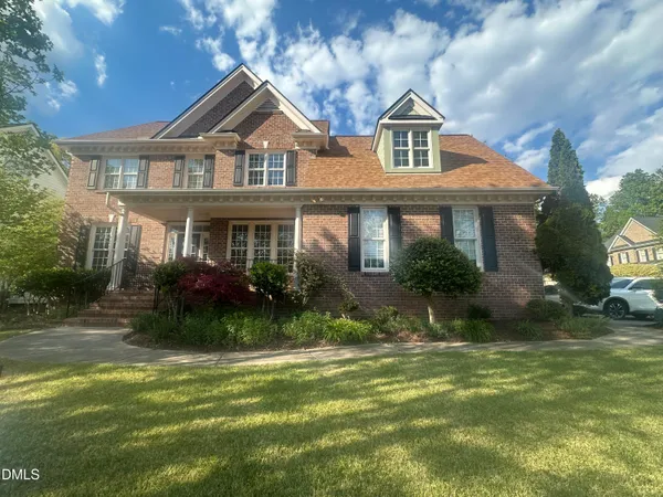 a front view of house with yard
