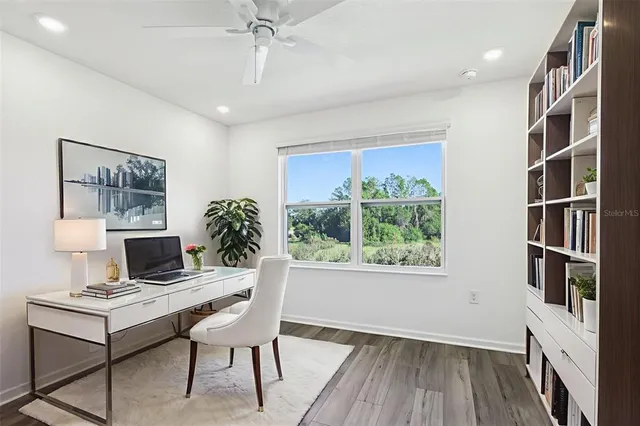 a workspace with furniture and a window