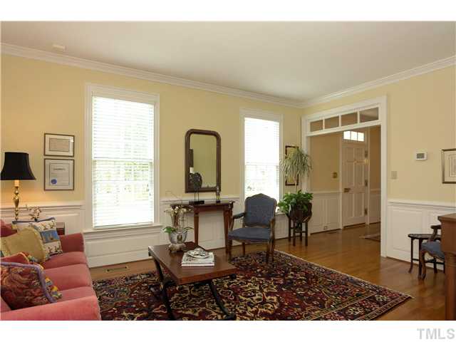 10028 Old Warden Road Raleigh, NC 27615 - Photo 4 of 25 a living room with furniture and a window
