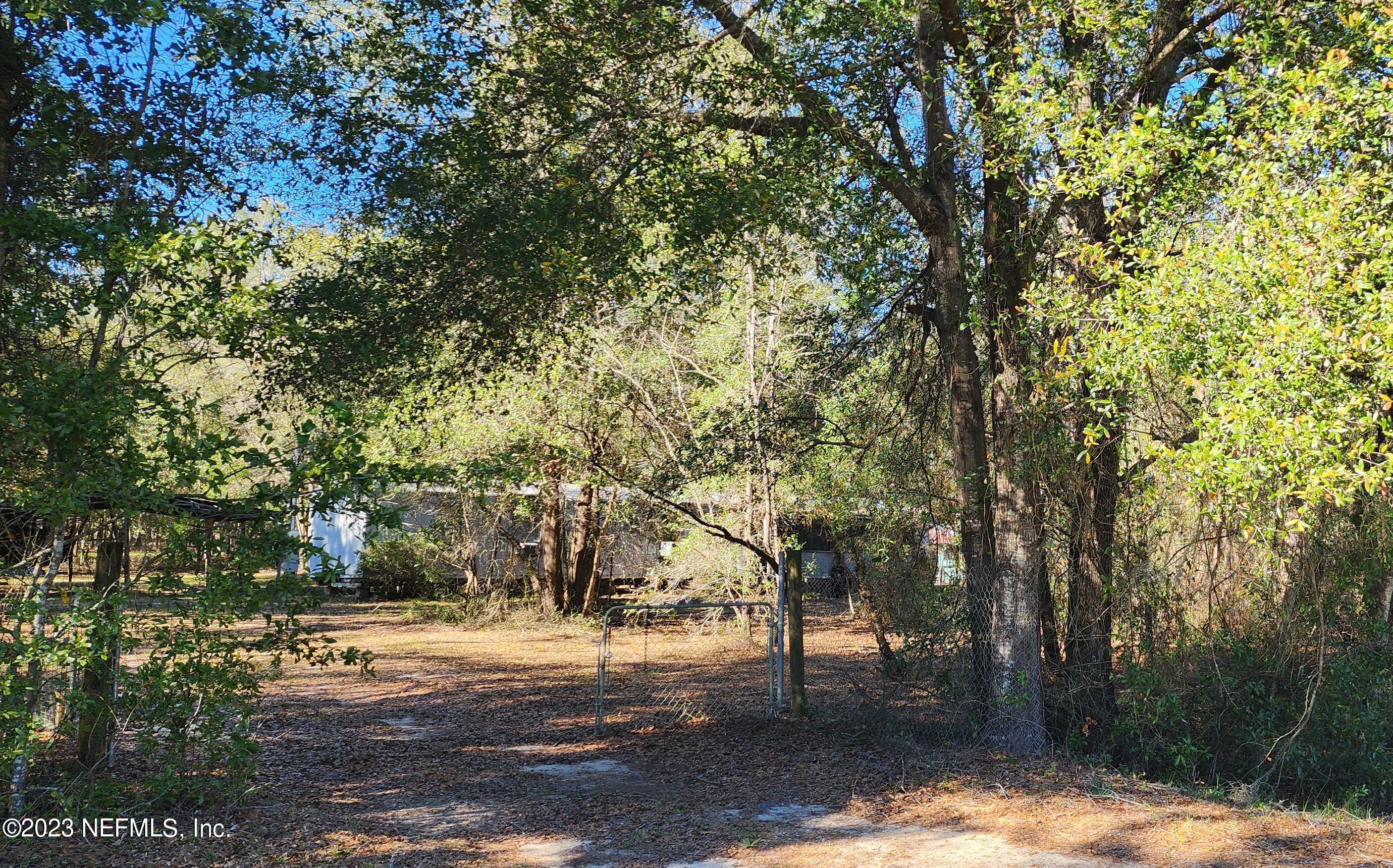 8274 Swan Lake Road Melrose, FL 32666 - Photo 5 of 18 Entrance from Rd