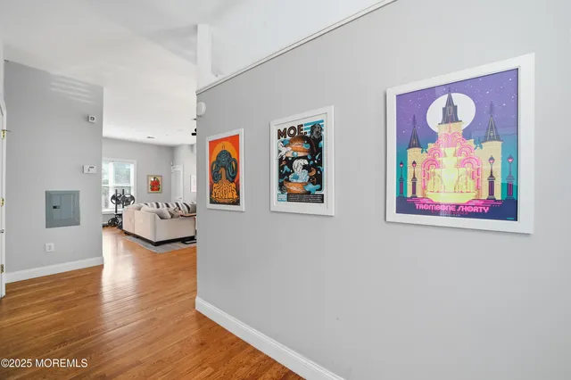 a bedroom with a bed and flat screen tv