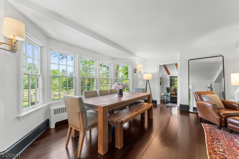 29 Bedens Brook Road Skillman, NJ 08558 - Photo 12 of 50 a view of a dining room with furniture window and wooden floor