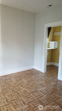 a view of empty room with a sink