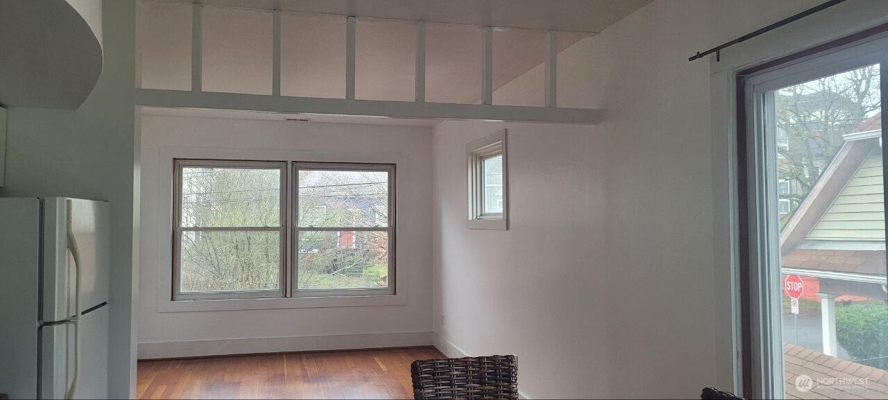722 20th Avenue Seattle, WA 98122 - Photo 6 of 21 a view of an empty room with a window