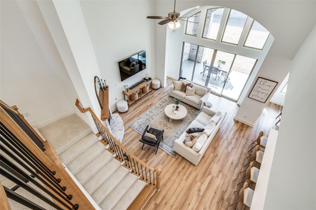 440 Sounding Street Aubrey, TX 76227 - Photo 2 of 40 a view of living room and wooden floor