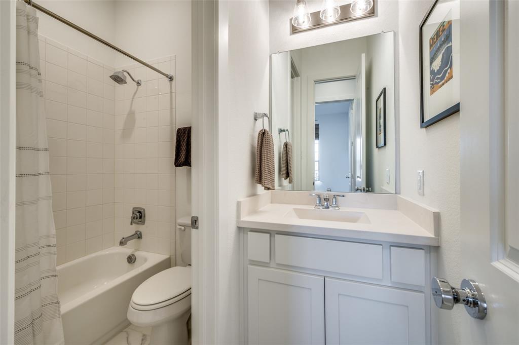 440 Sounding Street Aubrey, TX 76227 - Photo 21 of 40 a bathroom with a sink toilet tub and shower