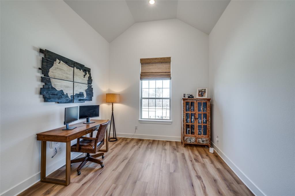 440 Sounding Street Aubrey, TX 76227 - Photo 22 of 40 a workspace with furniture hardwood and a window