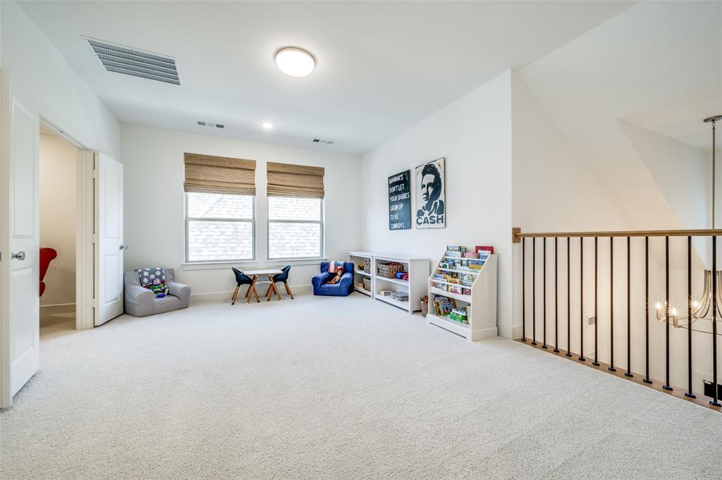 440 Sounding Street Aubrey, TX 76227 - Photo 24 of 40 a view of a livingroom with furniture and a window