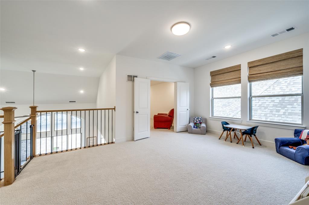 440 Sounding Street Aubrey, TX 76227 - Photo 25 of 40 a living room with furniture and a large window
