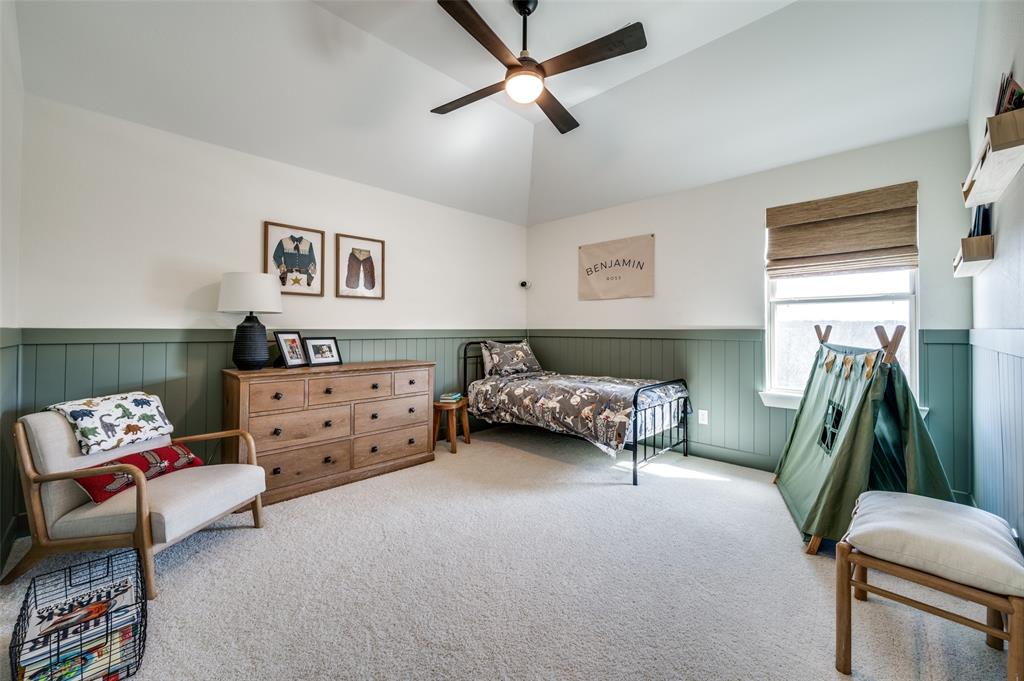 440 Sounding Street Aubrey, TX 76227 - Photo 27 of 40 a bedroom with furniture and a couch