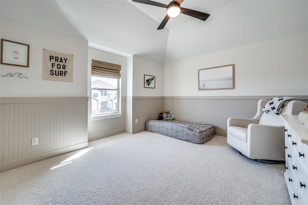 440 Sounding Street Aubrey, TX 76227 - Photo 29 of 40 a bedroom with bed and window
