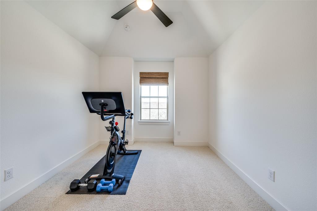 440 Sounding Street Aubrey, TX 76227 - Photo 30 of 40 a view of a room with gym equipment