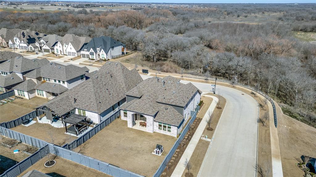 440 Sounding Street Aubrey, TX 76227 - Photo 37 of 40 an aerial view of a house with a yard