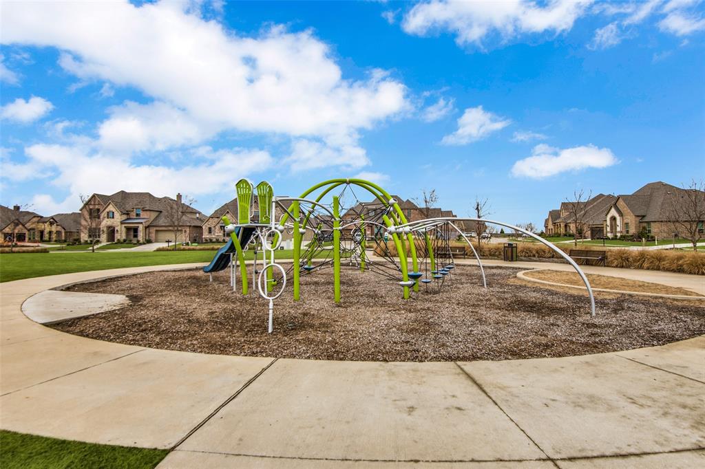 440 Sounding Street Aubrey, TX 76227 - Photo 40 of 40 a view of a park with swings and slides