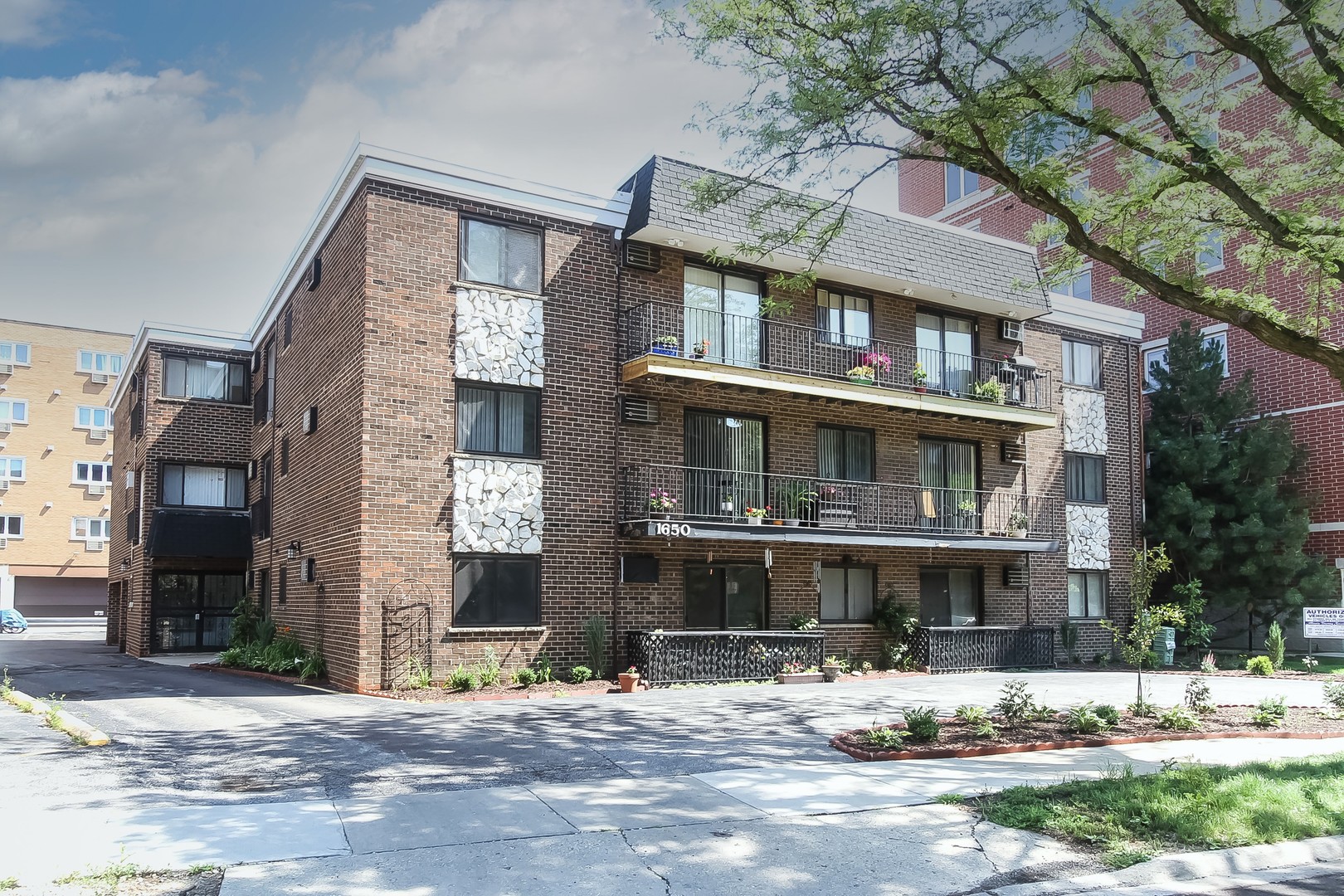 a view of a building with a yard