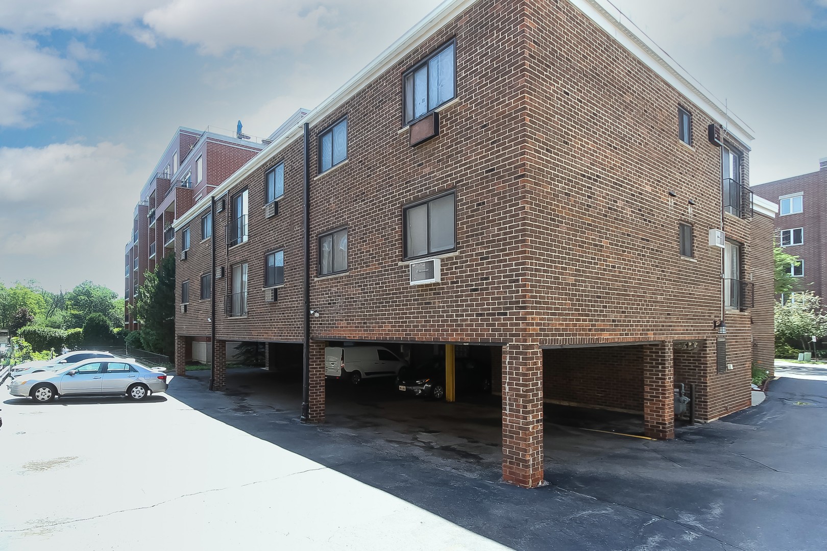 1650 Mill Street, Unit 103 Des Plaines, IL 60016 - Photo 18 of 19 a front view of house with yard