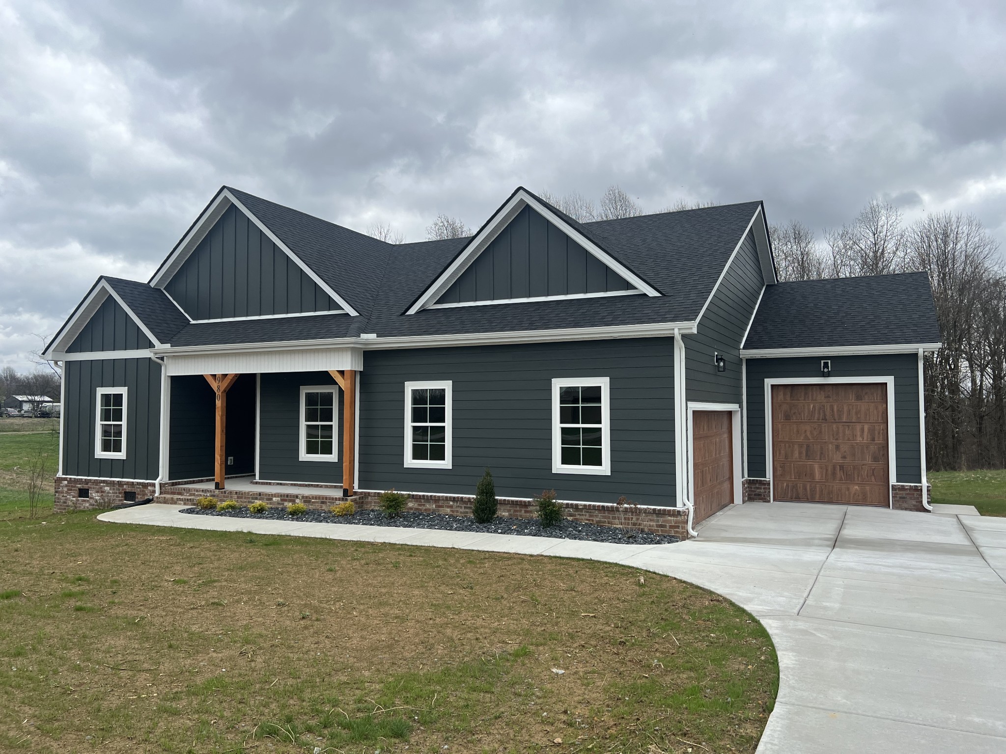 a front view of a house with yard