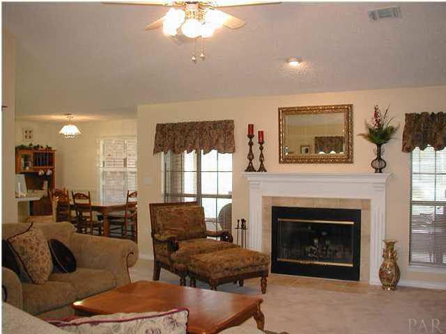 2401 Crescent Road Navarre, FL 32566 - Photo 2 of 9 Great room with beautiful tile fireplace.