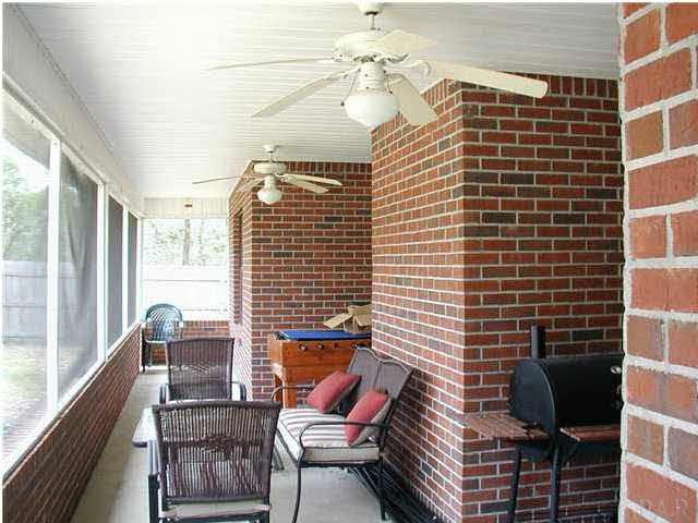 2401 Crescent Road Navarre, FL 32566 - Photo 8 of 9 Screened lanai.