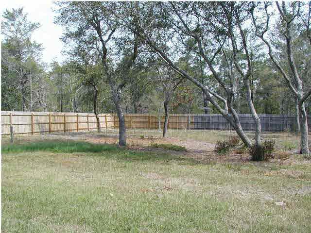 2401 Crescent Road Navarre, FL 32566 - Photo 9 of 9 This photo of the very large back yard is only part of the picture. There is another large portion that sits on the opposite side of the privacy fence.