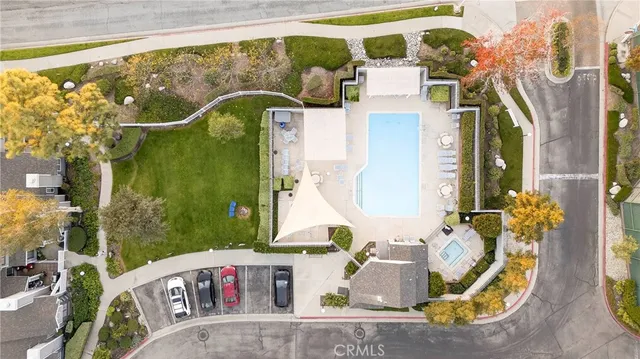 swimming pool view with a outdoor seating space