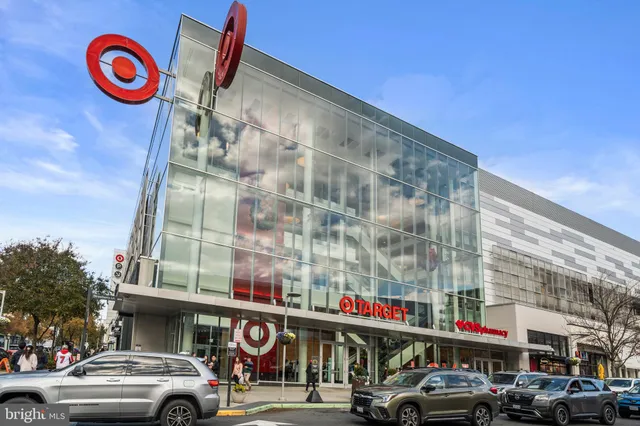 a front view of a building with parking