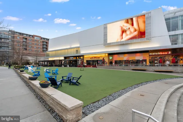 a living room with lots of furniture and entertaining space